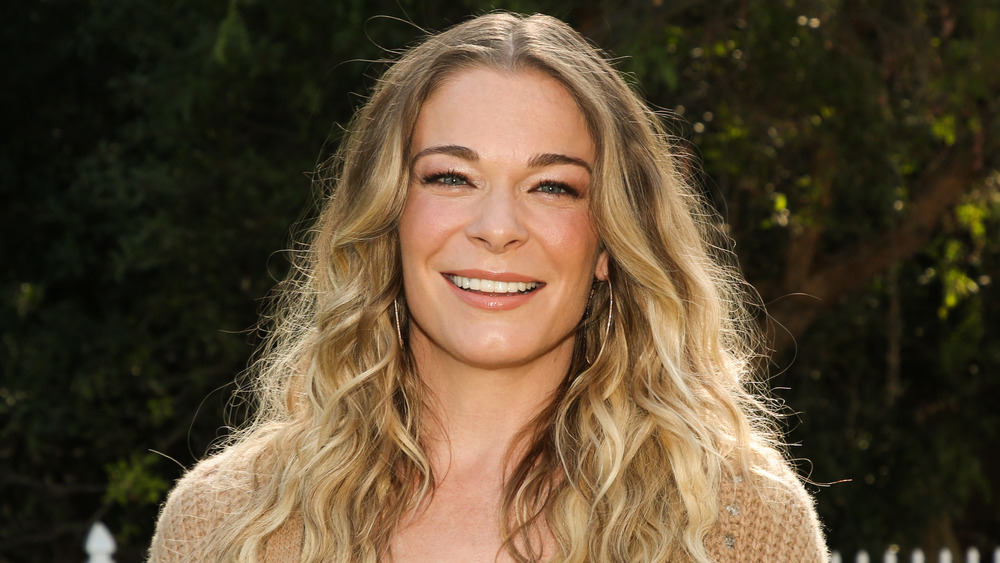 LeAnn Rimes wearing a cardigan outside