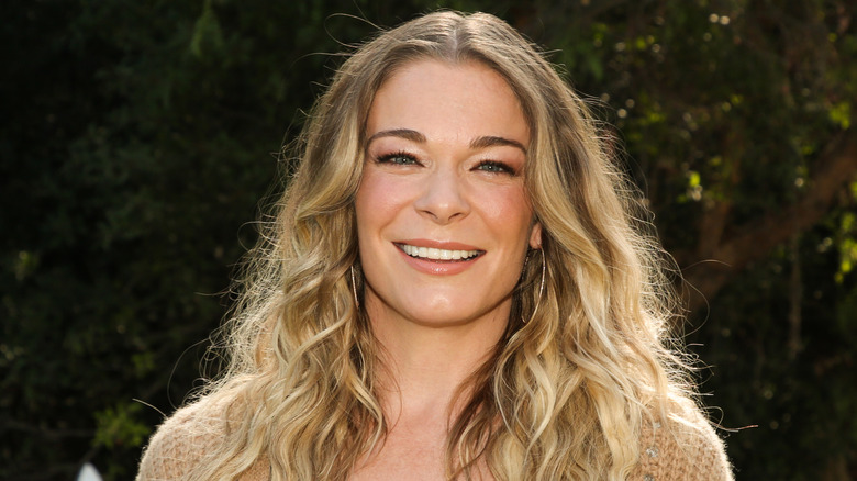 LeAnn Rimes wearing a cardigan outside