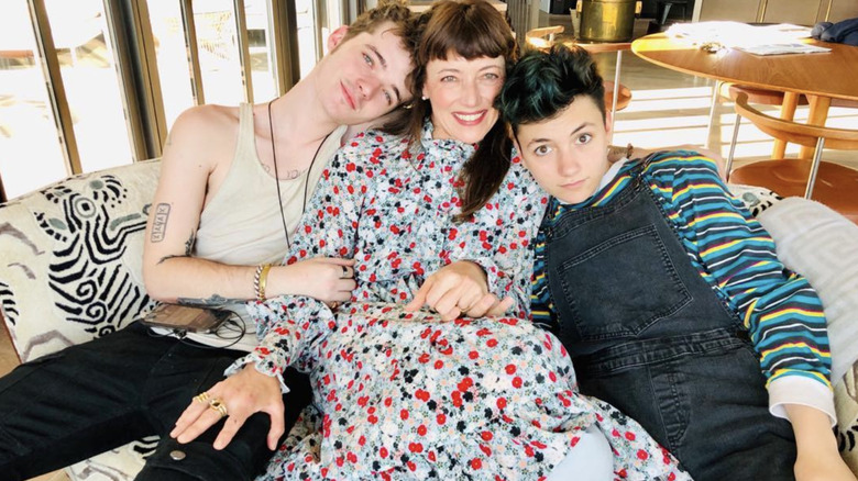 Mia Sara posing with her two kids