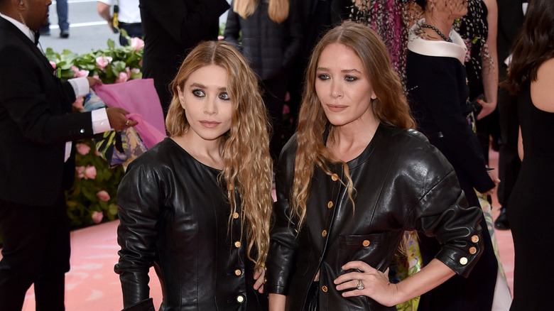 The Olsen twins posing