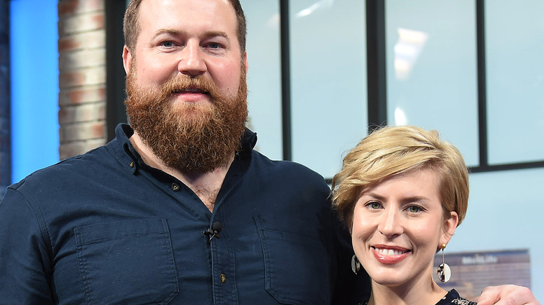 Erin and Ben Napier pose at an event