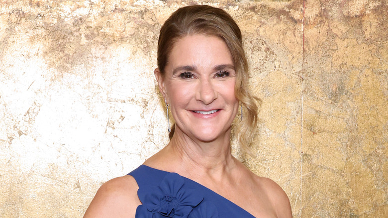 Melinda French Gates smiling wearing blue dress