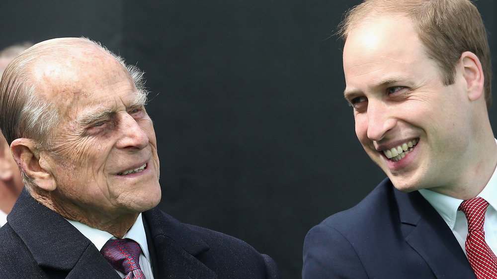 Prince William and Prince Philip smiling