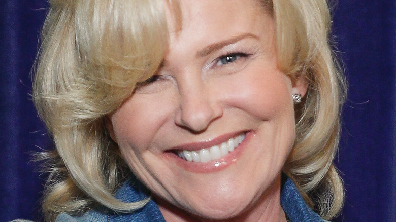 Judi Evans smiles at an event. 