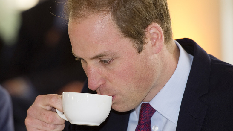 Prince William enjoying a cup of tea