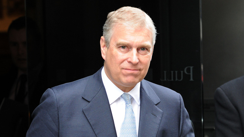 Prince Andrew smiling at the camera