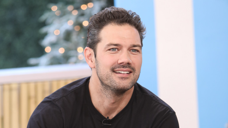 Ryan Paevey smiling