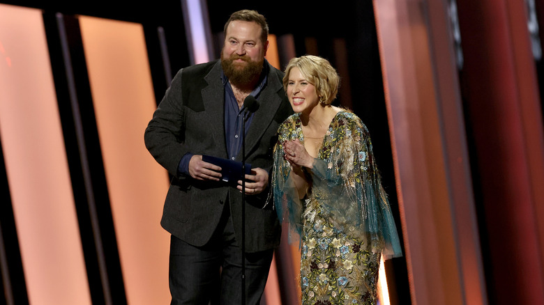 Ben and Erin Napier on stage, speaking