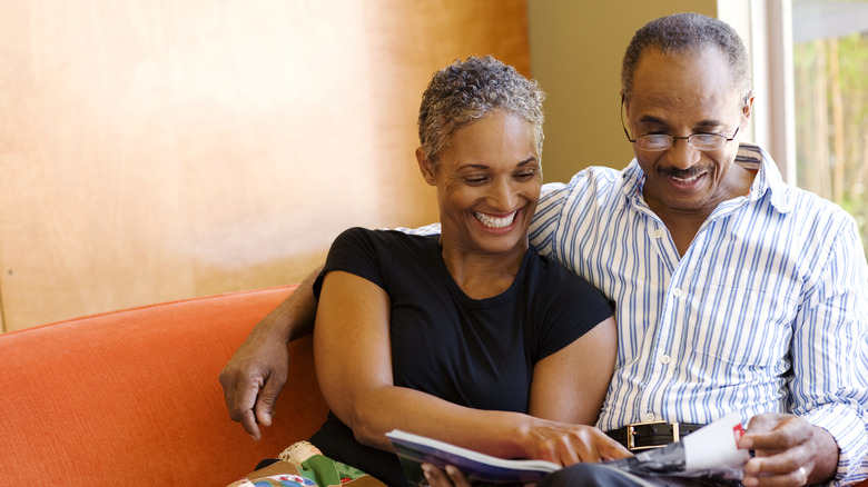 Couple sitting and smiling