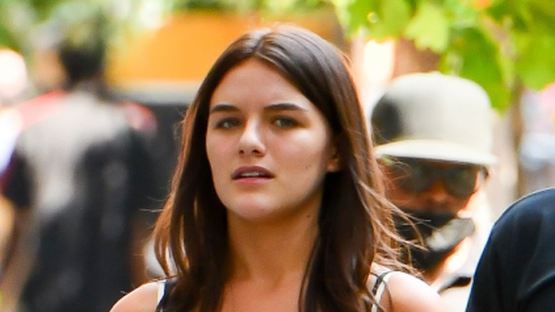 Suri Cruise walking outside in August 2025