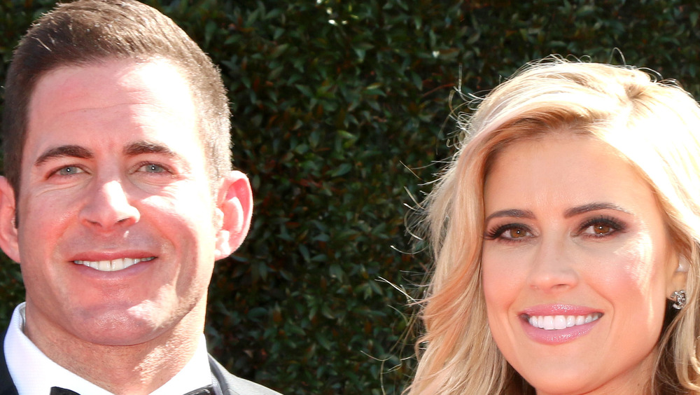 Tarek El Moussa, Christina Anstead posing