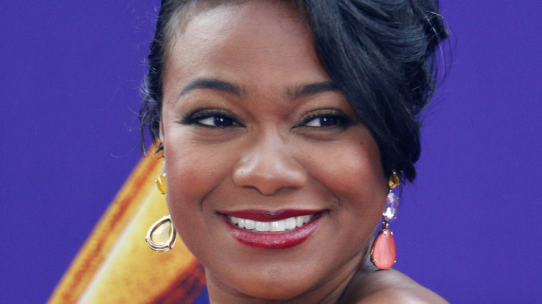 Tatyana Ali smiling on the red carpet