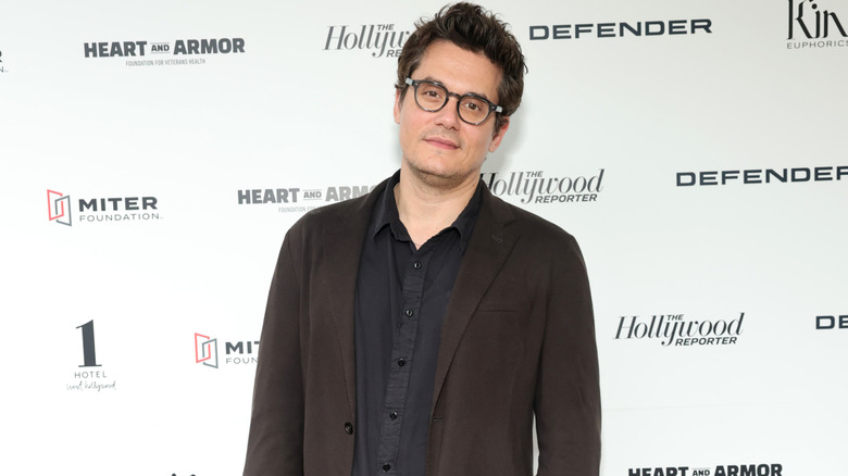 John Mayer posing on the red carpet