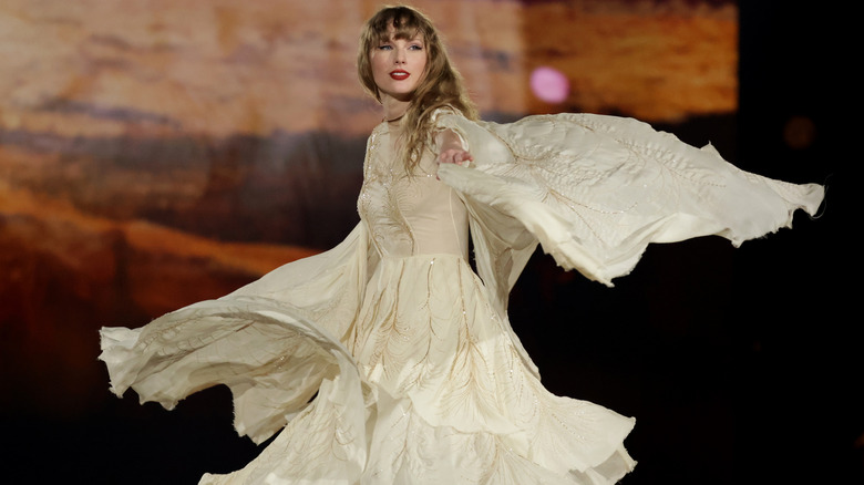 Taylor Swift in flowing white dress