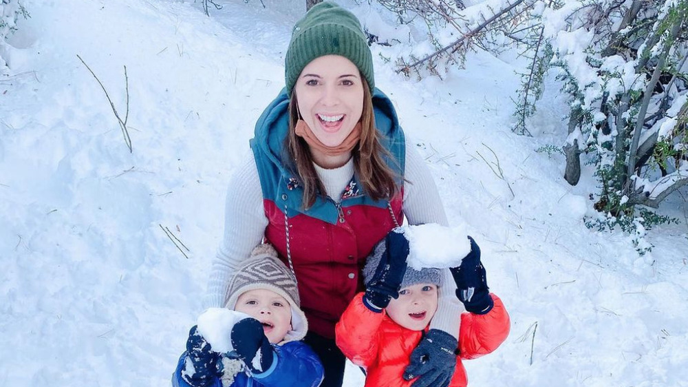 Lindsay Yenter playing in the snow with her sons