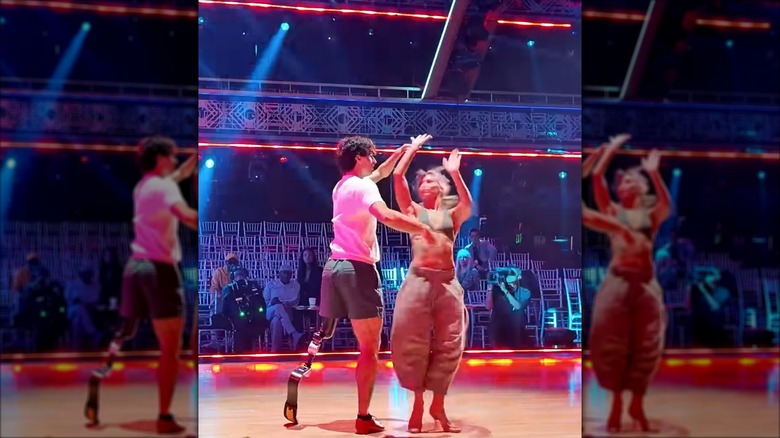 Ezra Frech and Daniella Karagach rehearsing on the DWTS stage
