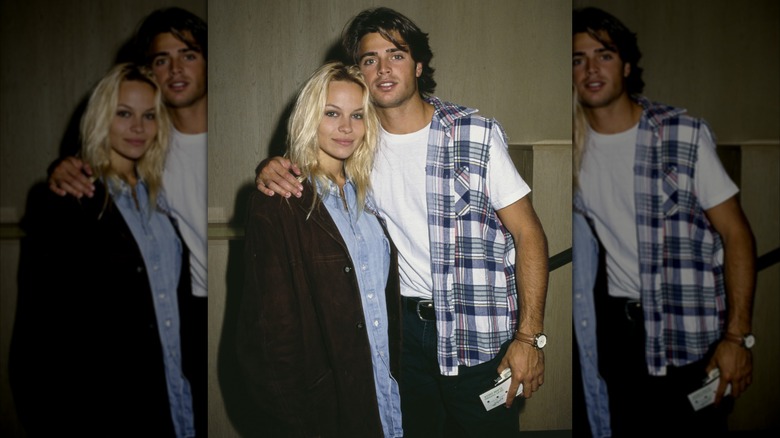 David Charvet with his arm around Pamela Anderson.