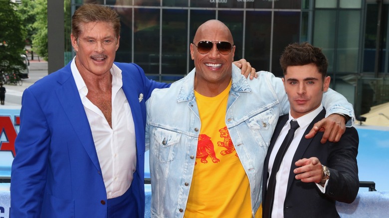 David Hasselhoff, Dwayne Johnson, and Zac Efron on the red carpet for the Baywatch movie.
