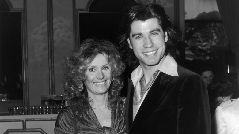 Diana Hyland and John Travolta in black-and-white