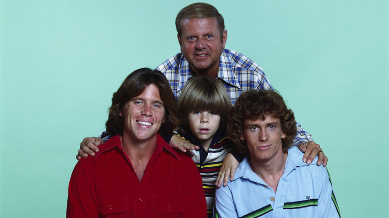 Actors from Eight is Enough in front of a green background