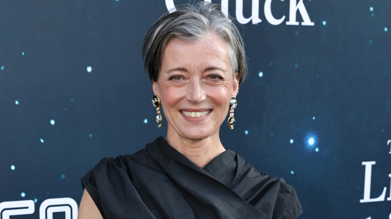 Mia Sara smiling