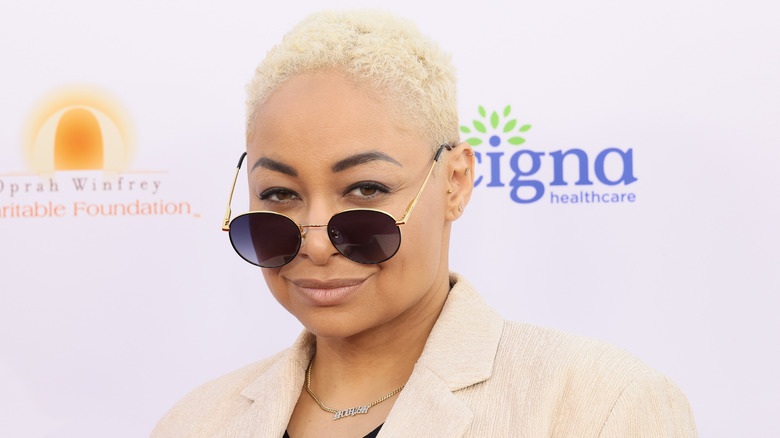 Raven-Symoné posing with sunglasses