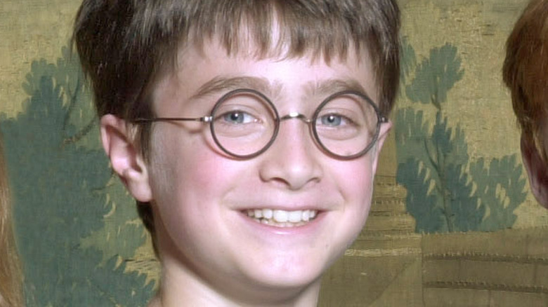 young Daniel Radcliffe wearing glasses