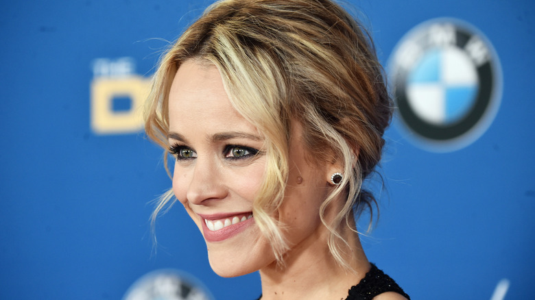 Rachel McAdams smiling with tied hair