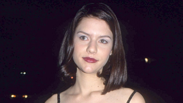 Teenage Claire Danes with short dark hair 