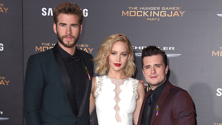 Liam Hemsworth, Jennifer Lawrence, and Josh Hutcherson at The Hunger Games premiere