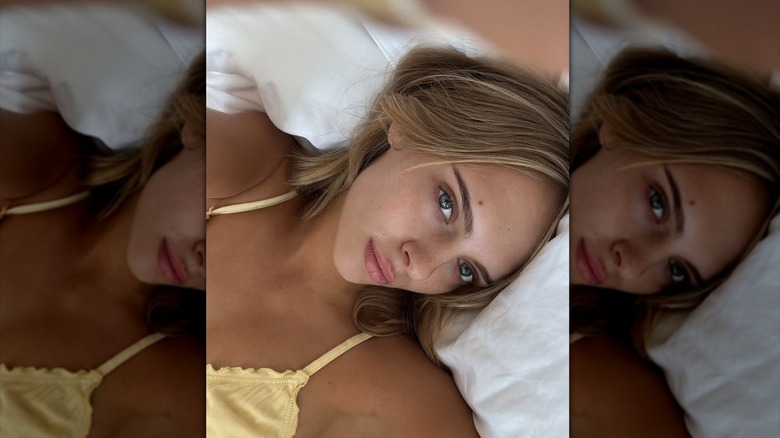 Jessica Belkin in an Instagram selfie on her bed