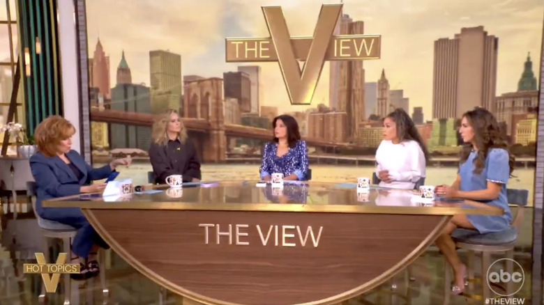 The co-hosts of The View sit around a table