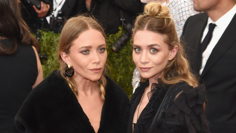 Mary-Kate and Ashley Olsen at a red carpet