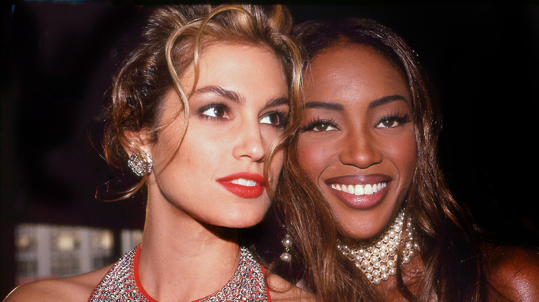 Cindy Crawford and Naomi Campbell at an event in the '90s