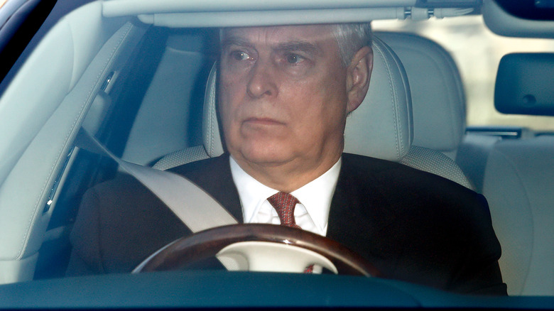 Prince Andrew pictured behind the wheel