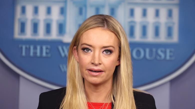 Kayleigh McEnany speaking in front of the seal in the White House briefing room