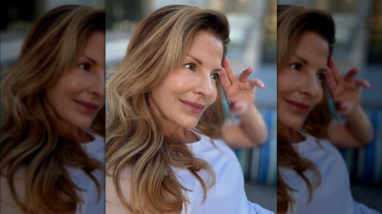 Patti Reilly poses for an Instagram selfie