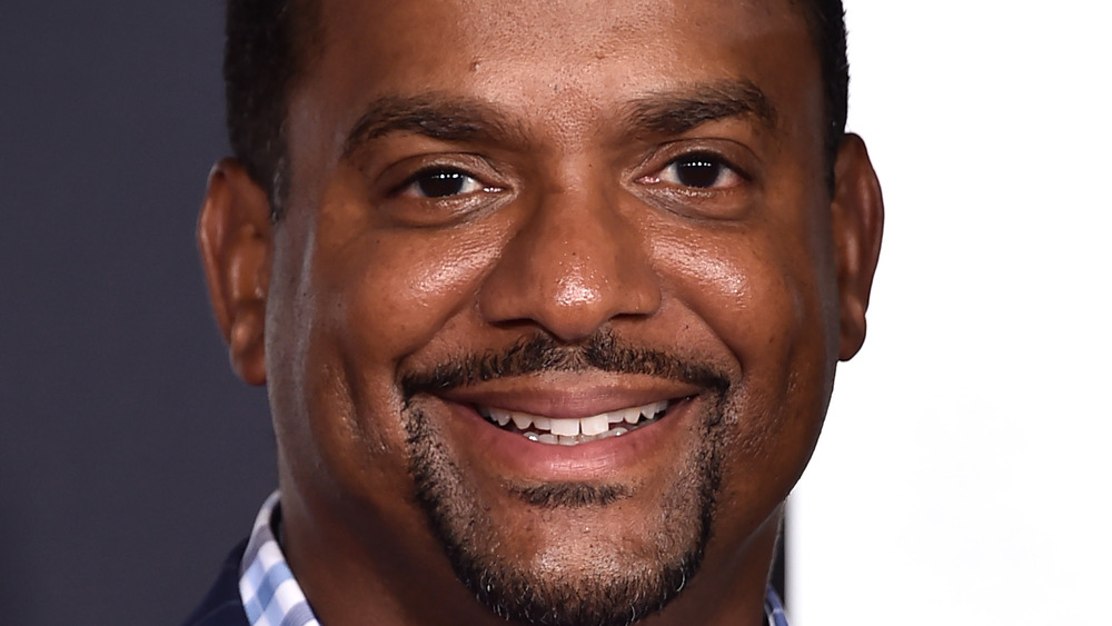 Alfonso Ribeiro smiling with facial hair