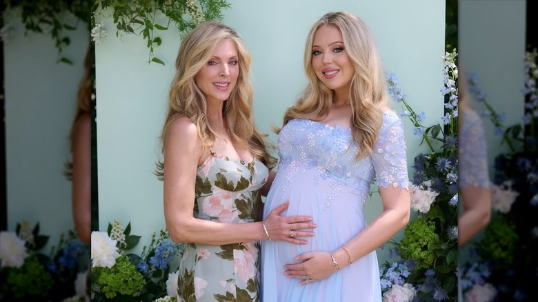 Marla Maples posing with her hand on Tiffany Trump's pregnant belly at her baby shower