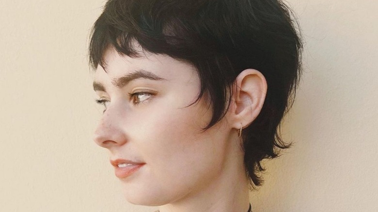 Side profile elf crop haircut
