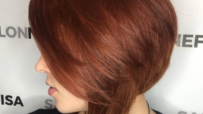 red velvet hair color in a pixie cut