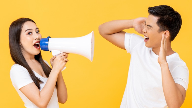 Woman talking through bullhorn