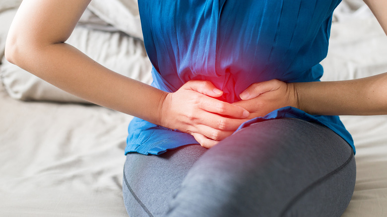 Woman experiencing pelvic pain