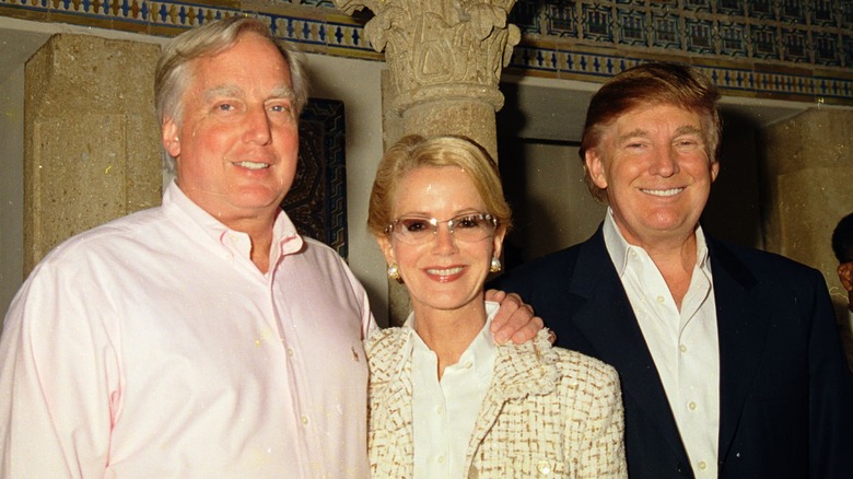 Robert Trump (L) and wife with Donald Trump (R)