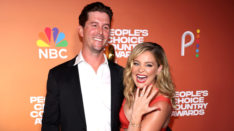 Lauren Alaina and Cam Arnold showing off ring
