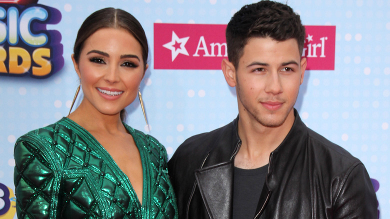 Olivia Culpo and Nick Jonas on red carpet