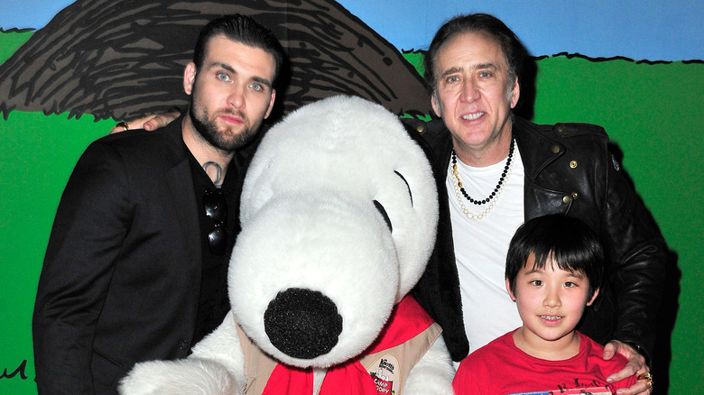 Nicolas Cage poses with two of his sons