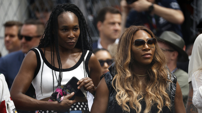 Venus and Serena Williams looking serious