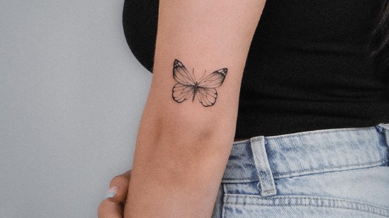 Butterfly tattoo on an arm