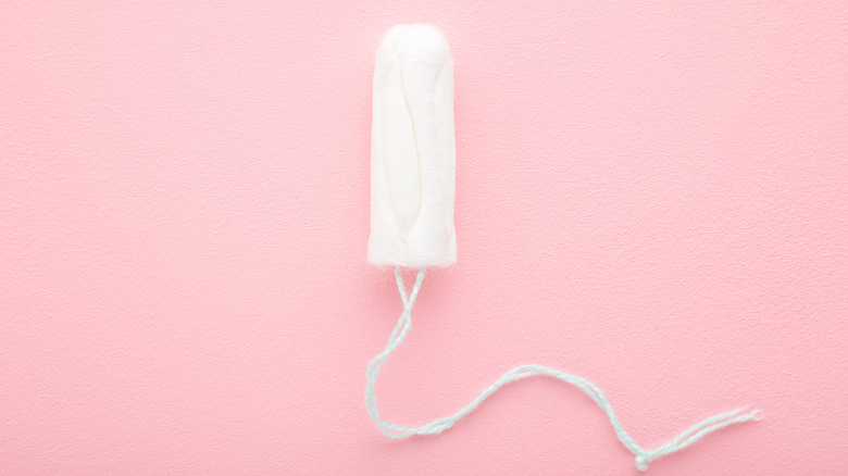 white tampon and pink background